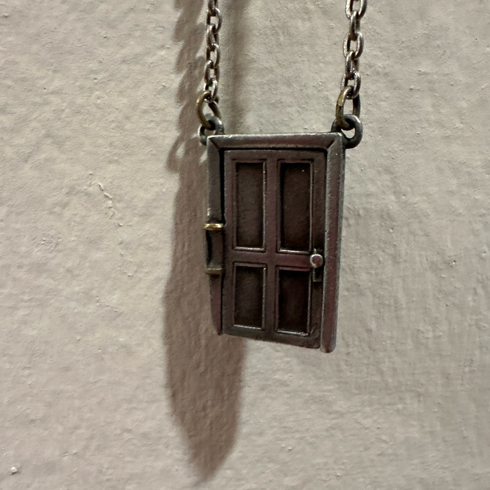 Antique pewter door necklace opens up so cute!